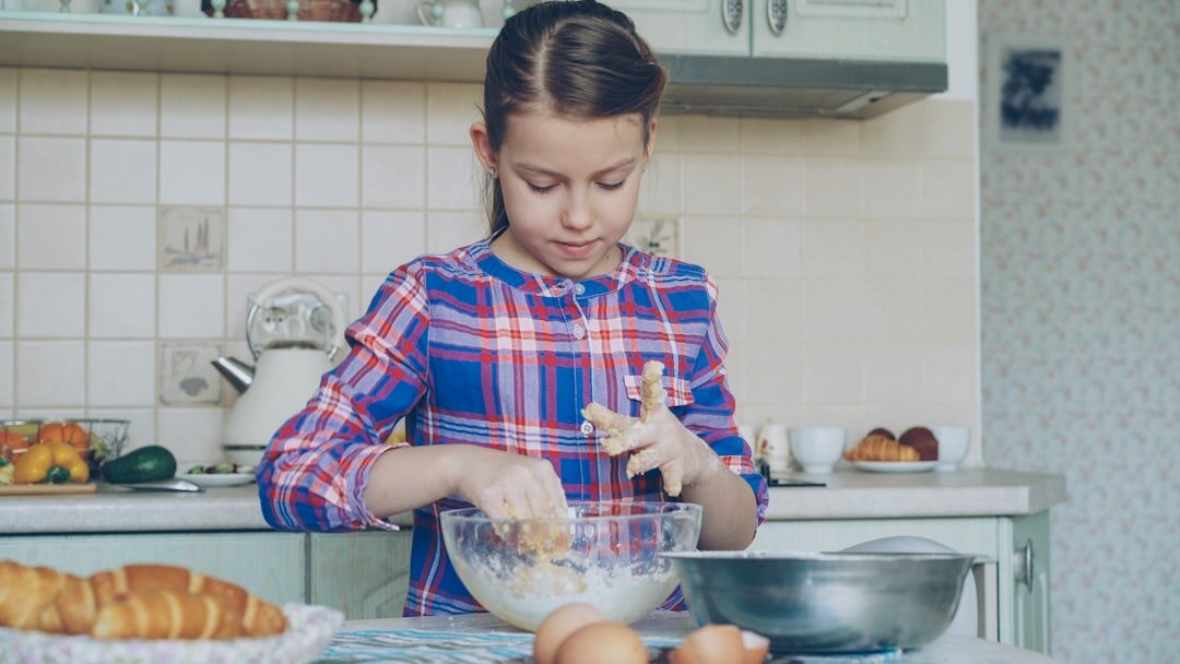 Czech woman baking buchty in a home kitchen
