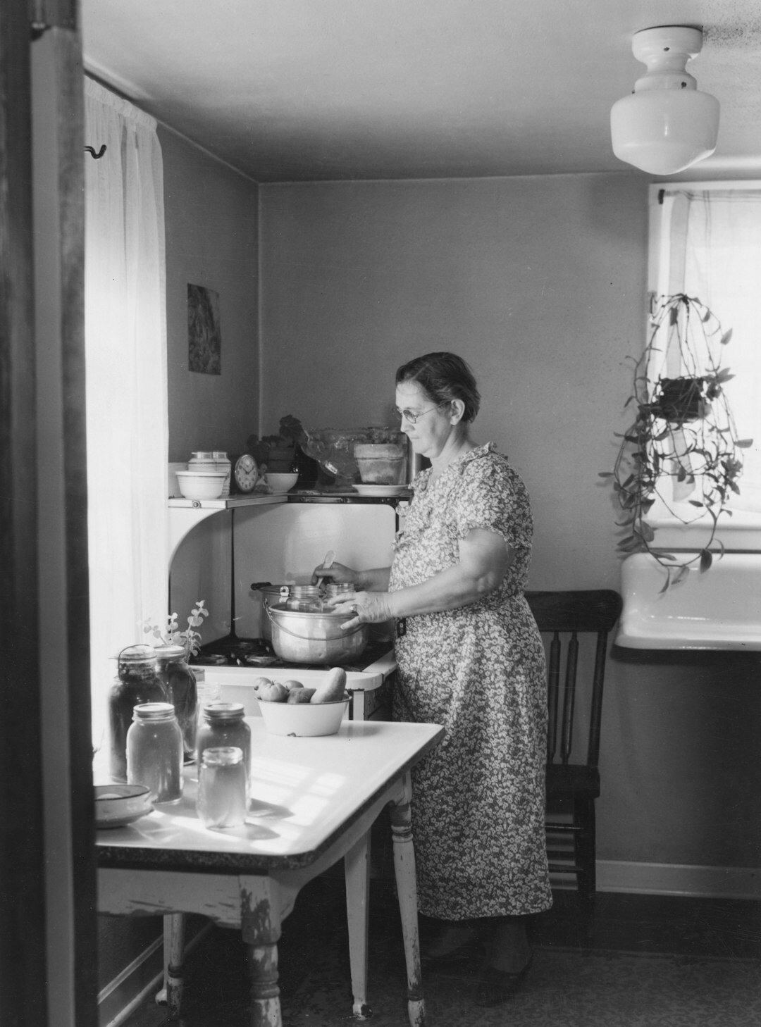 person cooking at home stove